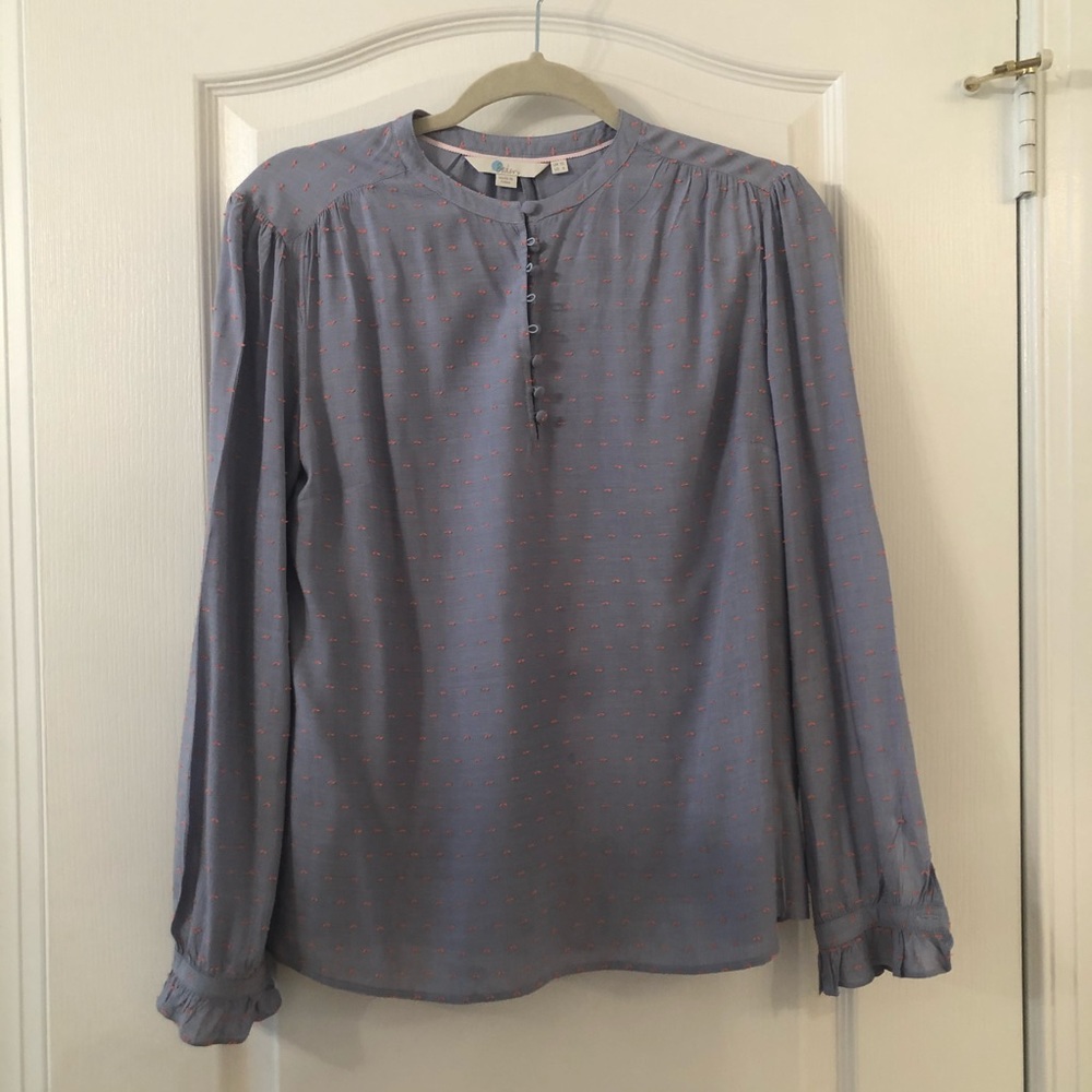 Boden blue blouse with pink detail.